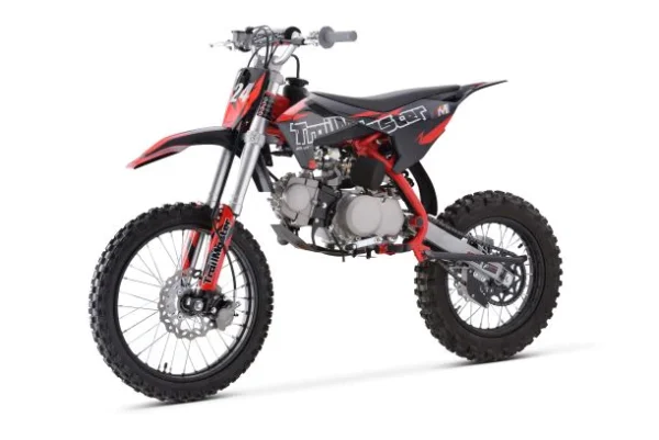 A dirt bike is shown with the wheels off.