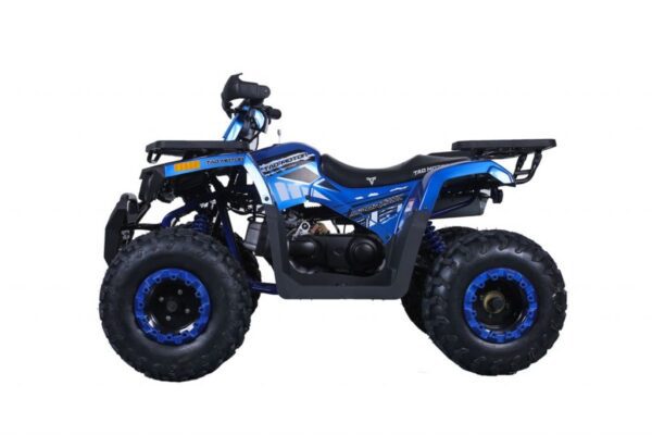 A blue and black atv is parked on the ground