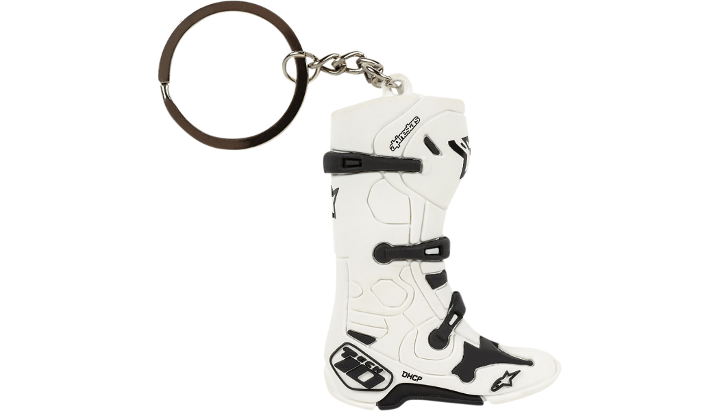A white motorcycle boot keychain with black accents.