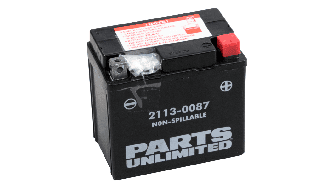 A motorcycle battery is shown with the words " parts unlimited " on it.