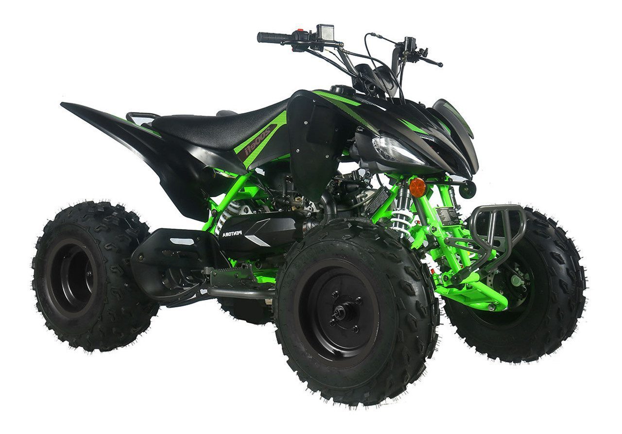 A green and black atv is parked on the ground.